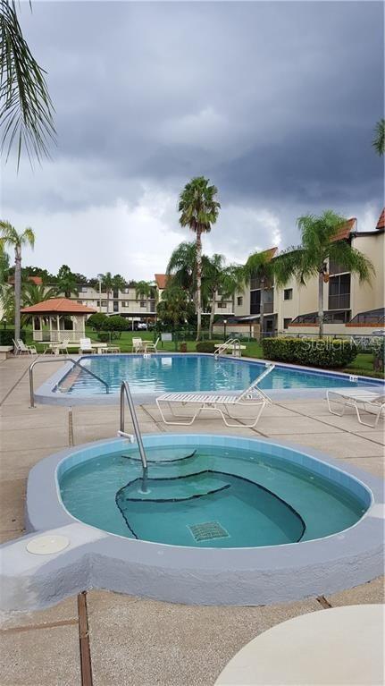 2420 WINDING CREEK BOULEVARD UNIT 201, CLEARWATER, FL — photo 3 of 4