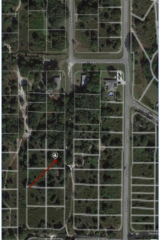 An aerial map view shows a vacant residential lot marked with a red arrow — 1445 HIGHLANDS ROAD, PUNTA GORDA, FL