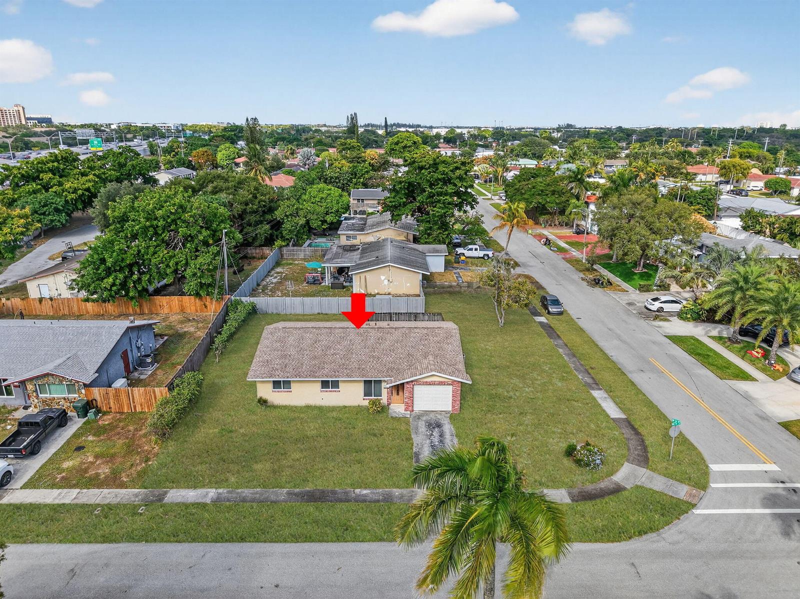An aerial view shows a single-story house with a shingled roof and a front garage — 1601 NW 5th Street, Boca Raton FL 33486, BOCA RATON, FL