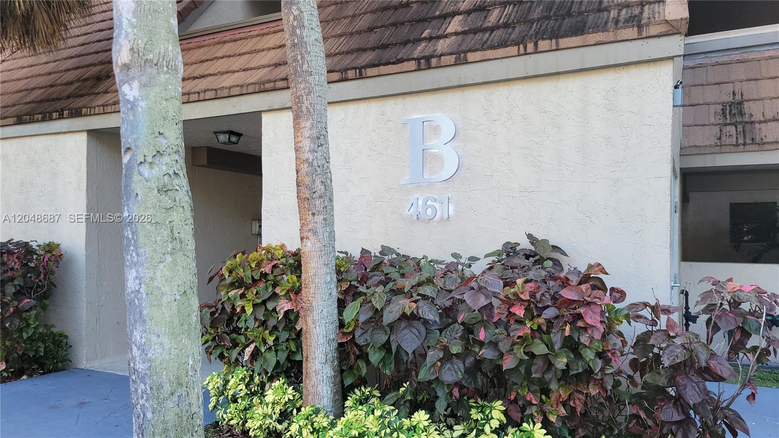 The exterior of a building features a large letter B and the number 461 — 461 Ives Dairy Rd # 2, Miami FL 33179, MIAMI, FL