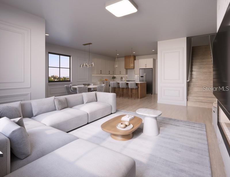 This is a rendering of an open-concept living room and kitchen with light wood flooring — 636 SIGLER DRIVE, WINTER GARDEN, FL