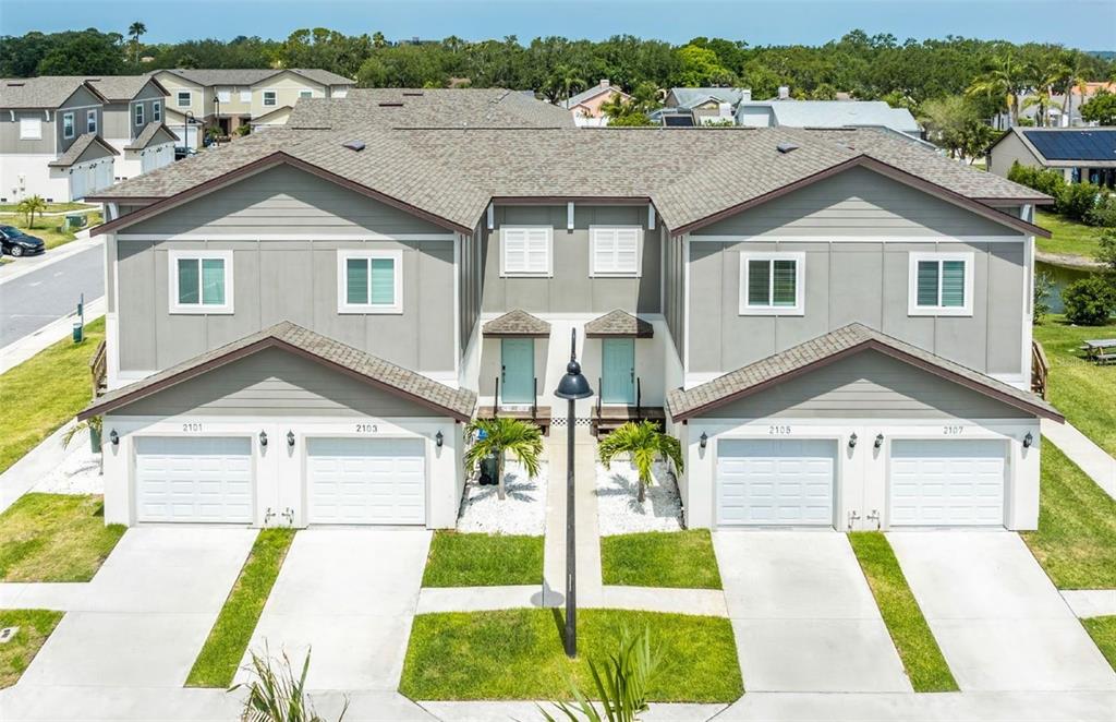 This is a 3D floor plan rendering of a two-story home with a garage — 2102 SEBRING PLACE, CLEARWATER, FL