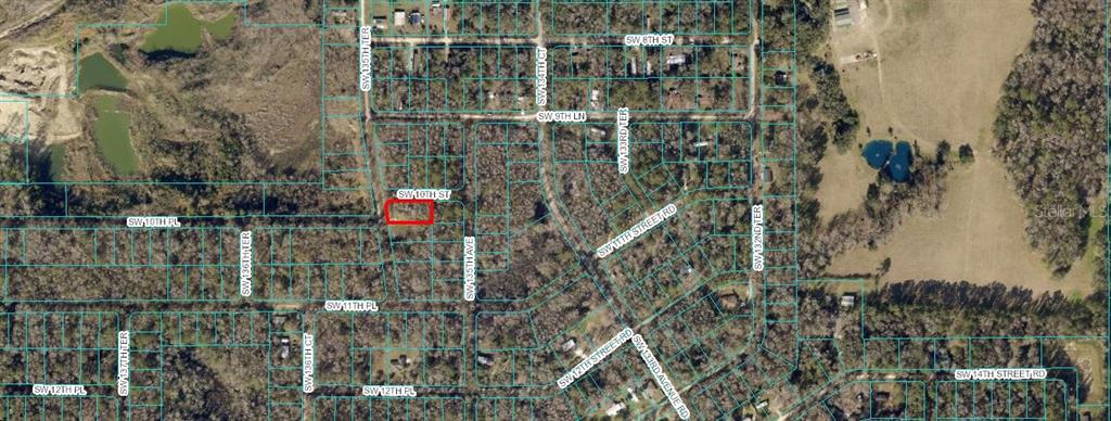This is an aerial map showing a highlighted residential lot in a wooded neighborhood — TBD SW 135 TERRACE, OCALA, FL