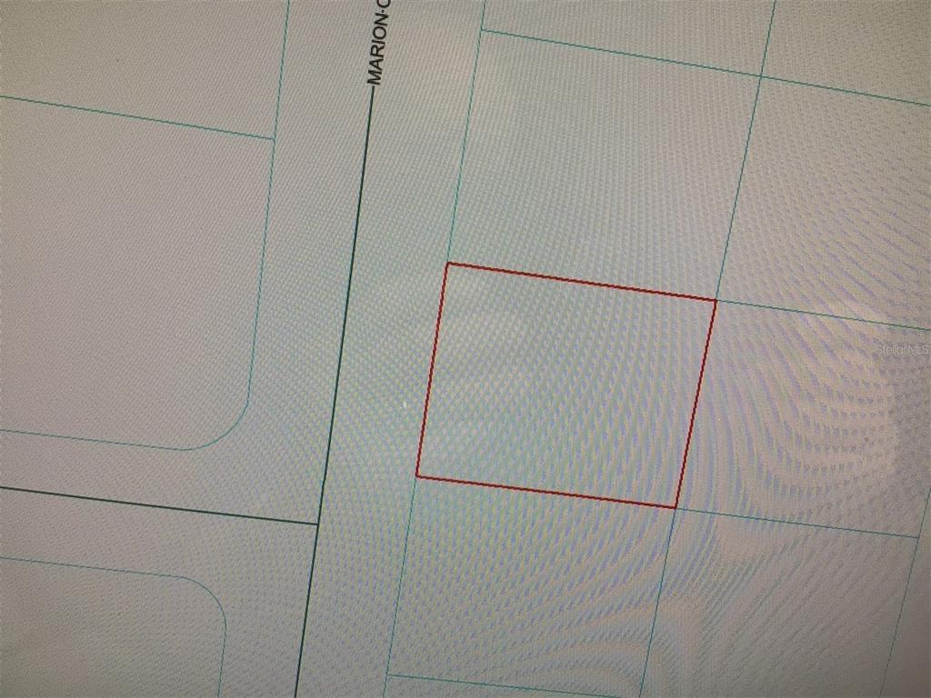 This is a map showing a rectangular property parcel outlined in red — MARION OAKS DRIVE, OCALA, FL