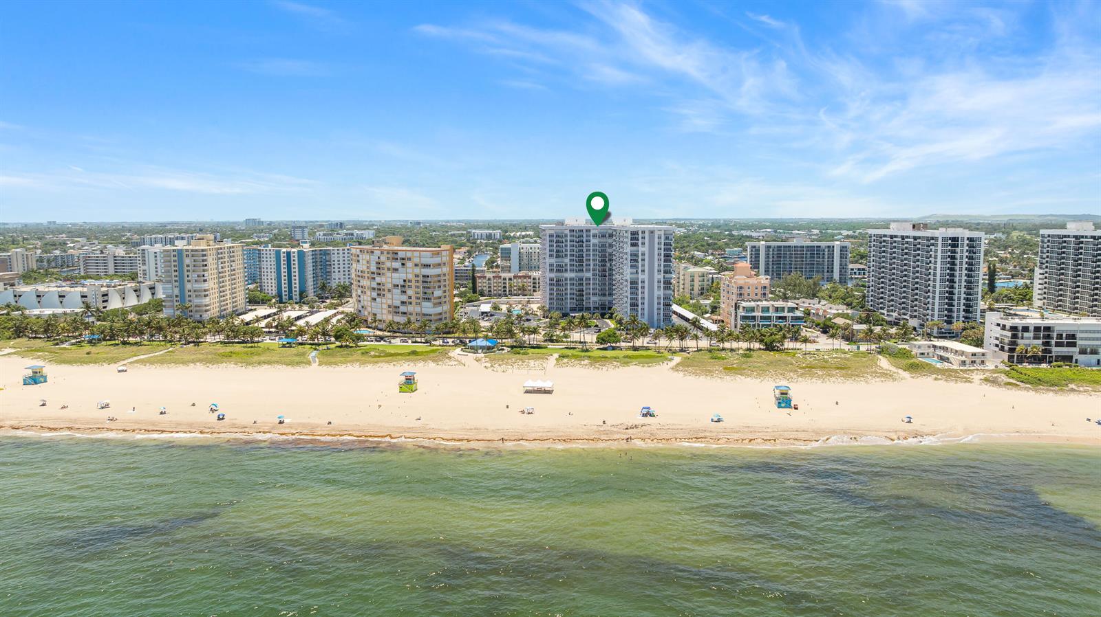 An aerial view of a beachfront high-rise building with a green location marker — 405 N Ocean Boulevard # 815, Pompano Beach FL 33062, POMPANO BEACH, FL