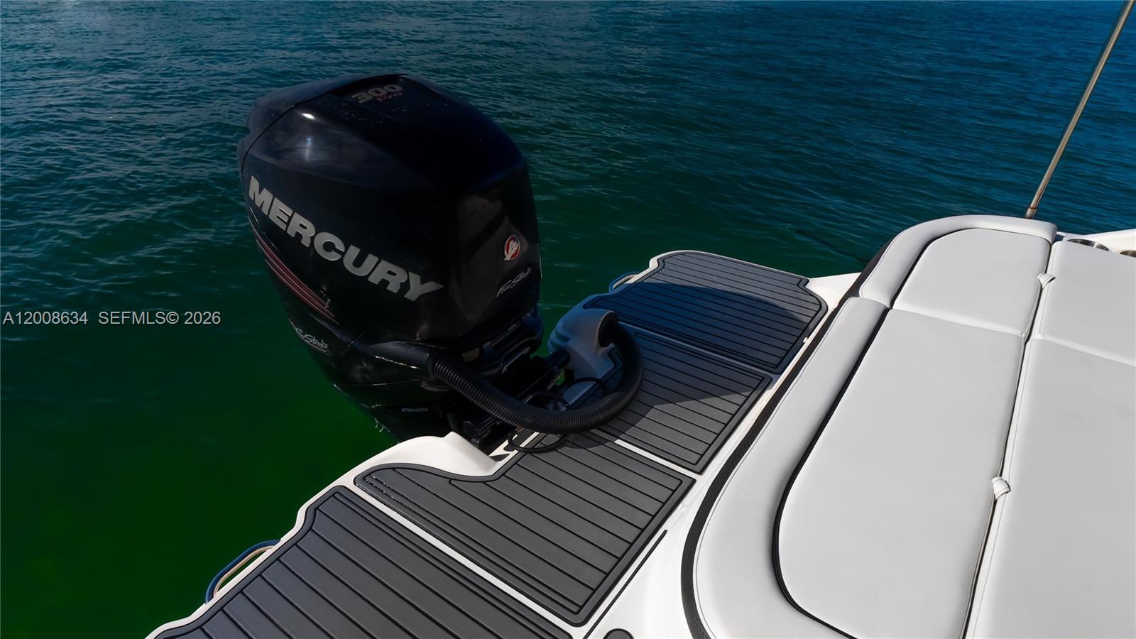 A Mercury 300 outboard motor is mounted to the rear of a boat with decking — 910 West Ave, Miami Beach FL 33139, MIAMI BEACH, FL