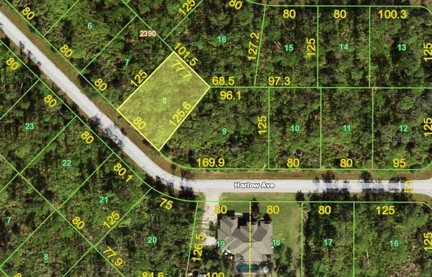 This is a map showing a highlighted vacant lot and surrounding parcels of land — 12520 HARLOW AVENUE, PORT CHARLOTTE, FL