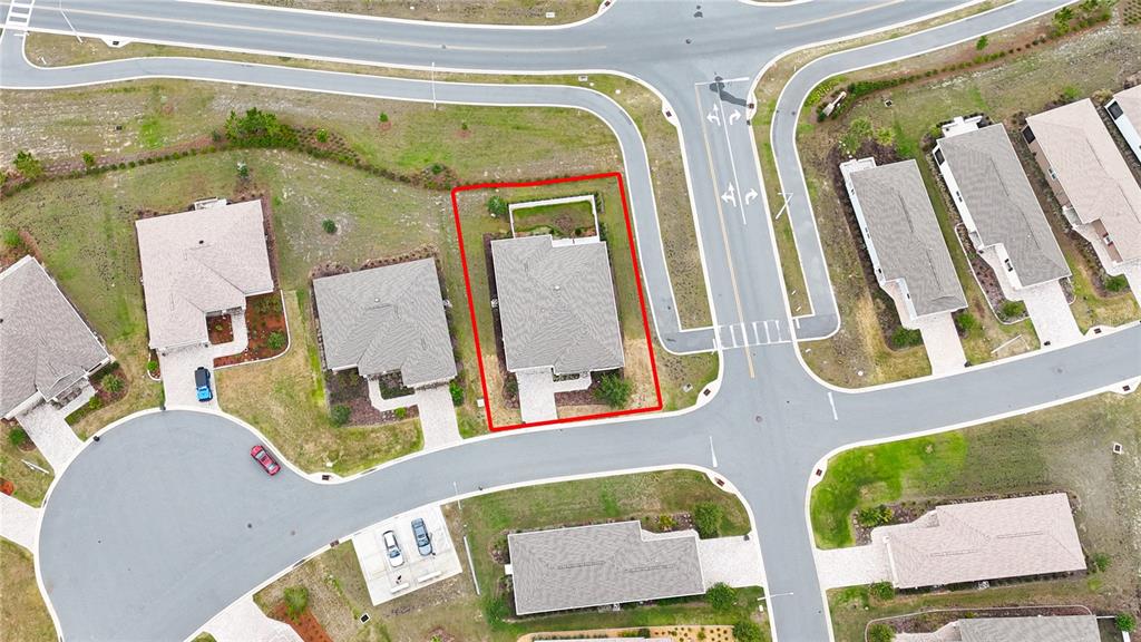 An aerial view shows a single-family home outlined in red within a suburban neighborhood — 10378 SW 96TH LOOP, OCALA, FL