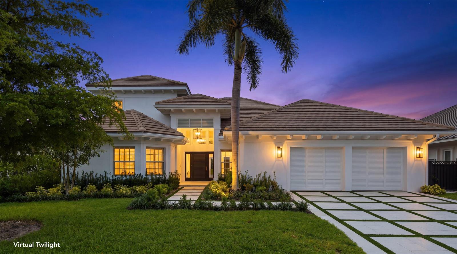 A white single-story house with a tiled roof, palm tree, and paved driveway at twilight — 204 Birkdale Lane, Jupiter FL 33458, JUPITER, FL