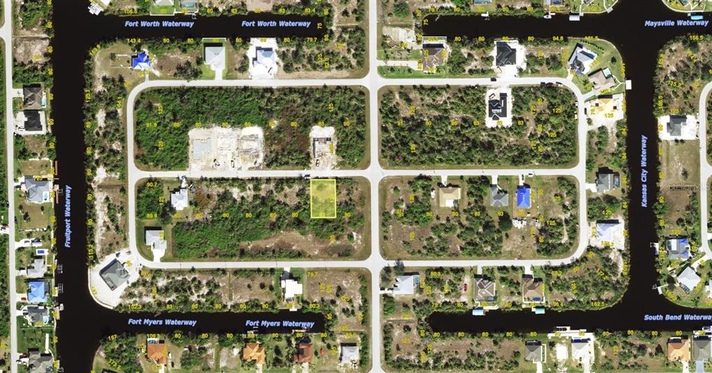 This is an aerial map showing a vacant residential lot highlighted in yellow — 14143 SOUTH BEND AVENUE, PORT CHARLOTTE, FL