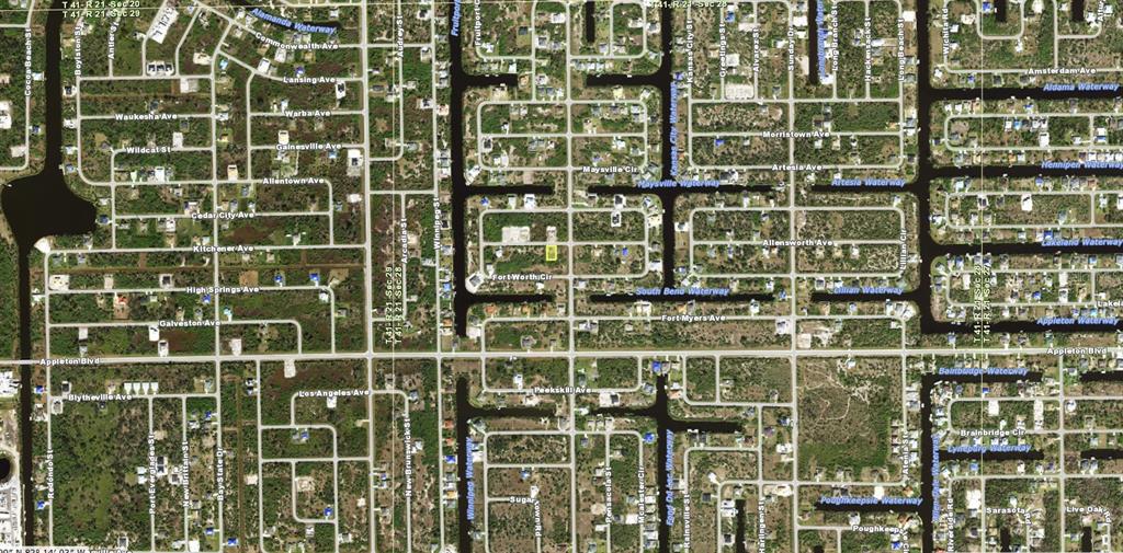 This is an aerial map showing a residential neighborhood with a grid of streets and canals — 14143 SOUTH BEND AVENUE, PORT CHARLOTTE, FL