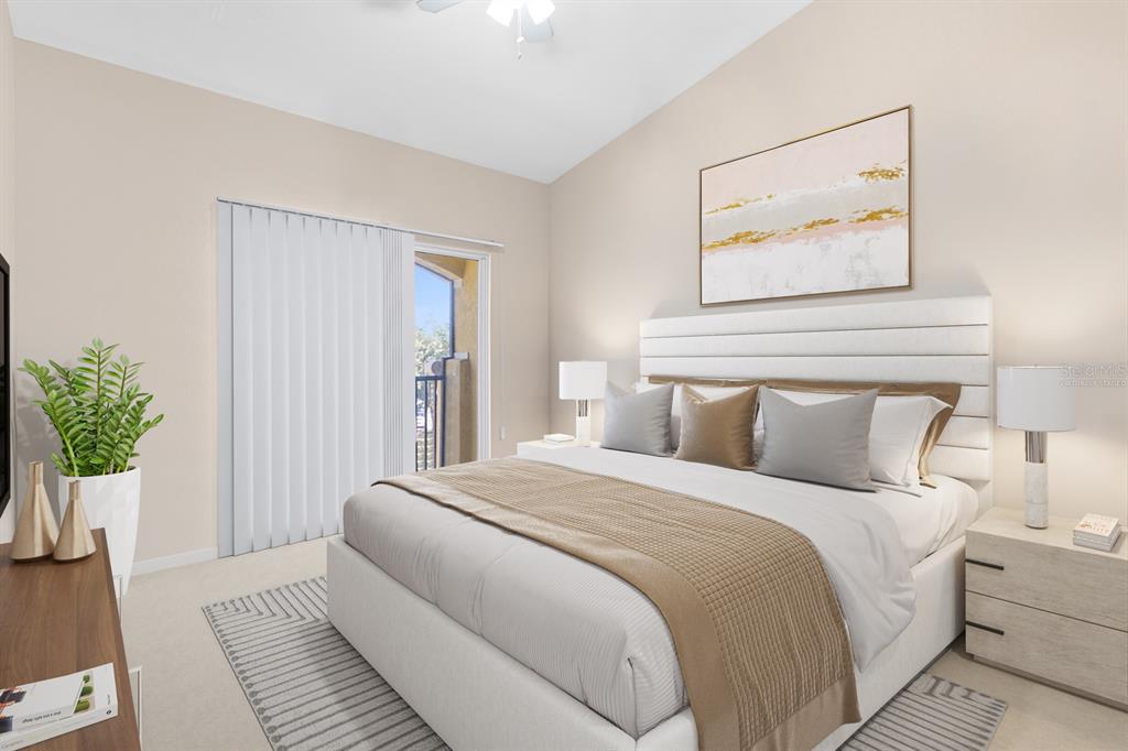 A bedroom features a bed with a white headboard, two nightstands, and a sliding glass door — 10211 COURTNEY PALMS UNIT 303, TAMPA, FL