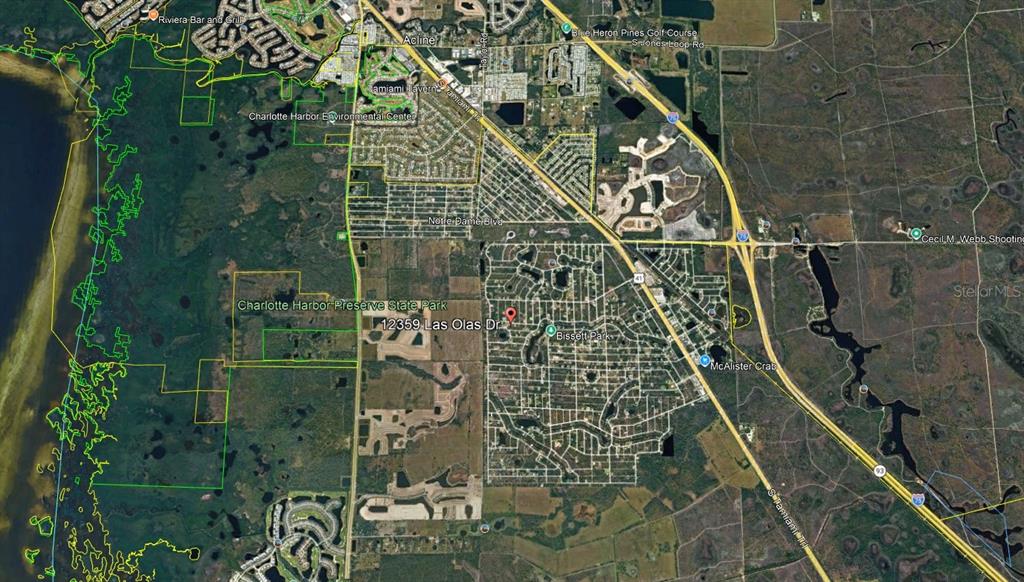 This is an aerial map view of a residential area near a state park — 12359 LOS OLAS DRIVE, PUNTA GORDA, FL