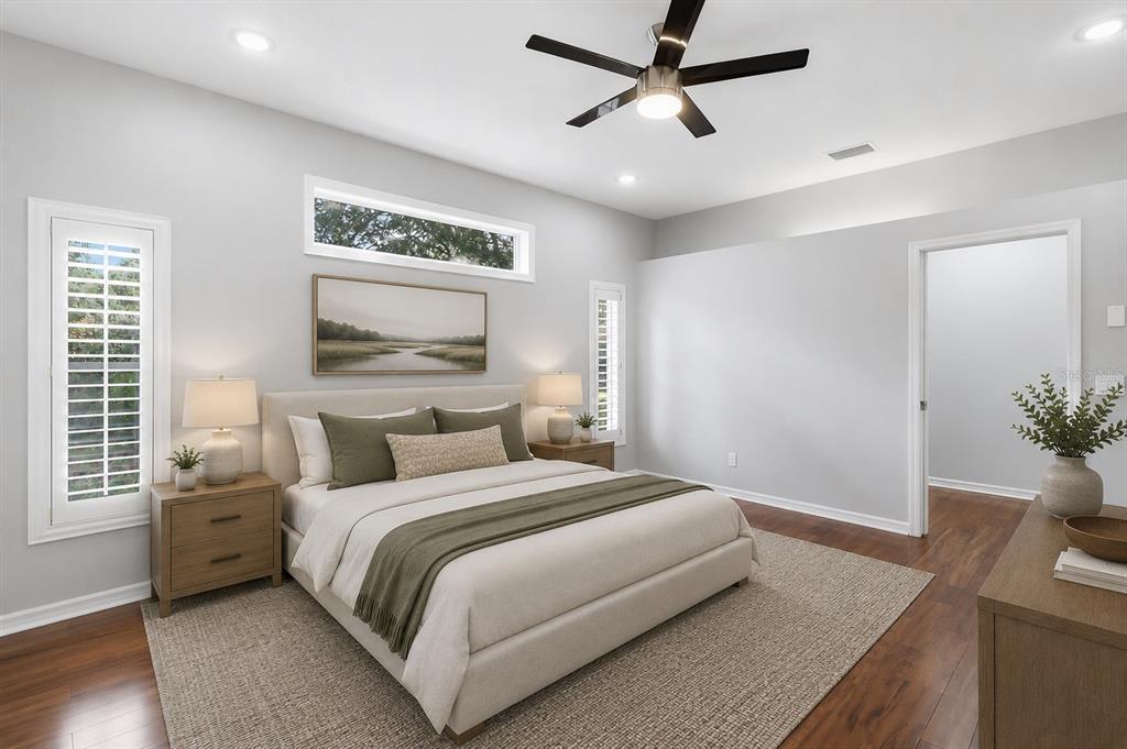 A bedroom features a queen bed, two nightstands, a ceiling fan, and hardwood flooring — 6484 W CANNONDALE DRIVE, CRYSTAL RIVER, FL