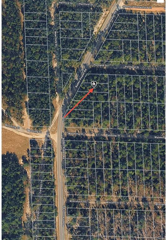 An aerial map view shows a vacant lot highlighted by a red arrow near roads — 608 BADEN POWELL ROAD, HAWTHORNE, FL