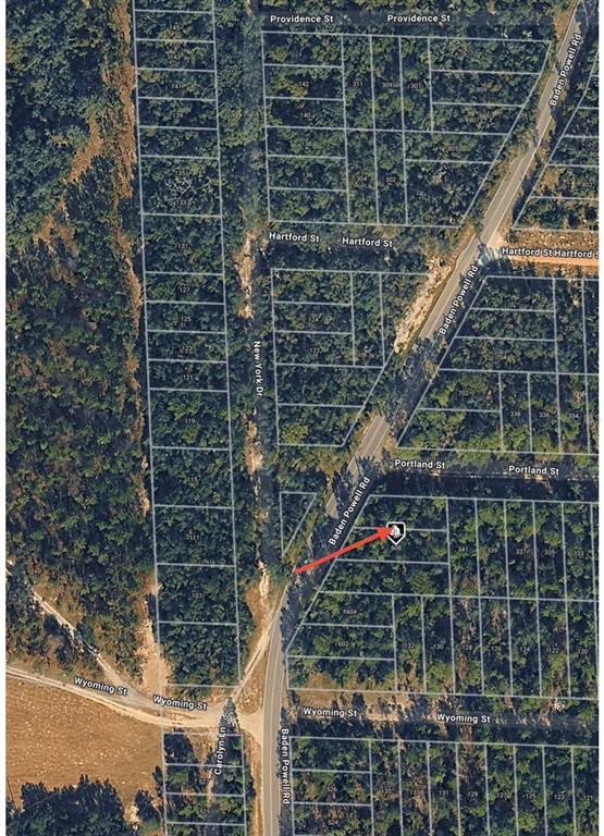 This is an aerial map showing a wooded residential area with a highlighted property lot — 608 BADEN POWELL ROAD, HAWTHORNE, FL