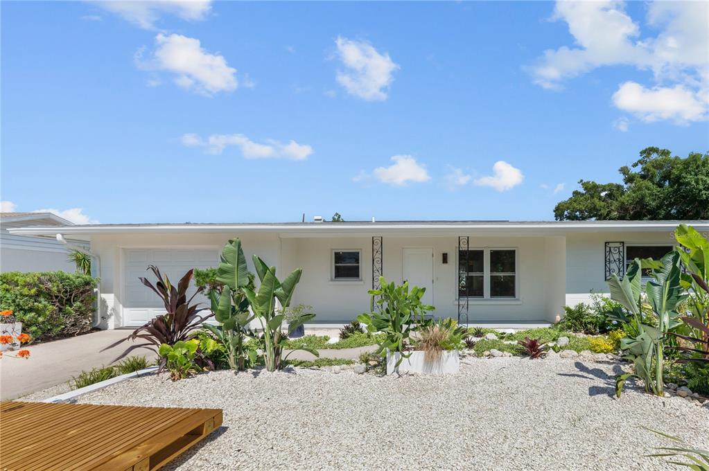 This is a floor plan showing a house with a garage, kitchen, and multiple bedrooms — 2513 CROTON AVENUE, SARASOTA, FL