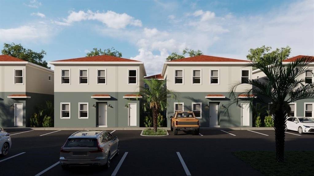 A digital rendering shows a row of two-story townhouses with a parking lot in front — 6925 E 21ST AVENUE, TAMPA, FL