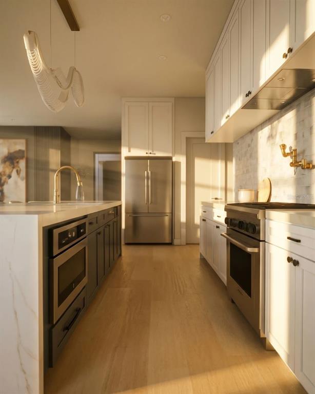 This is a rendering of a modern kitchen featuring white cabinetry, stainless steel appliances, and marble — 2501 COLE ROAD, ORLANDO, FL