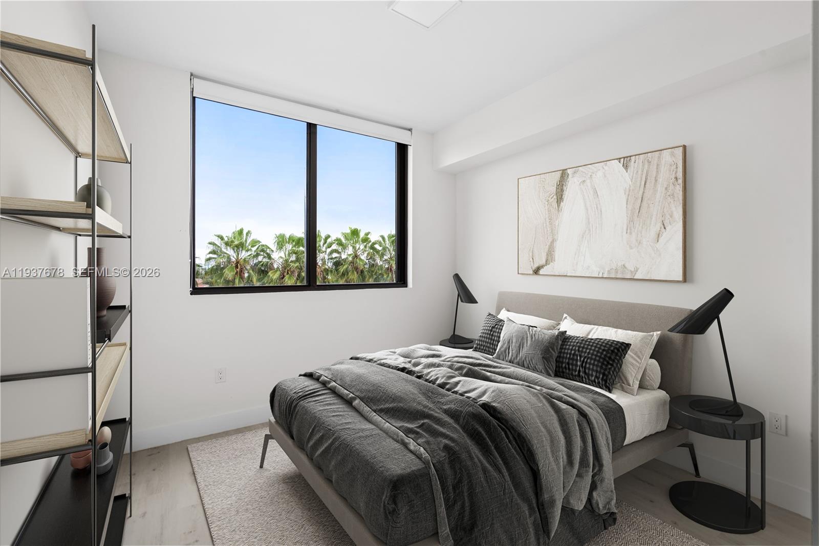 A modern bedroom features a bed, two black lamps, a tall shelving unit, and palm trees — 1601 SW 32 Avenue # 514, Miami FL 33145, MIAMI, FL