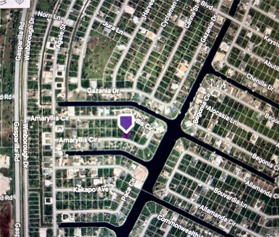 This is an aerial map view showing a residential neighborhood with a highlighted property lot — 13357 AMARYLLIS CIR, PORT CHARLOTTE, FL