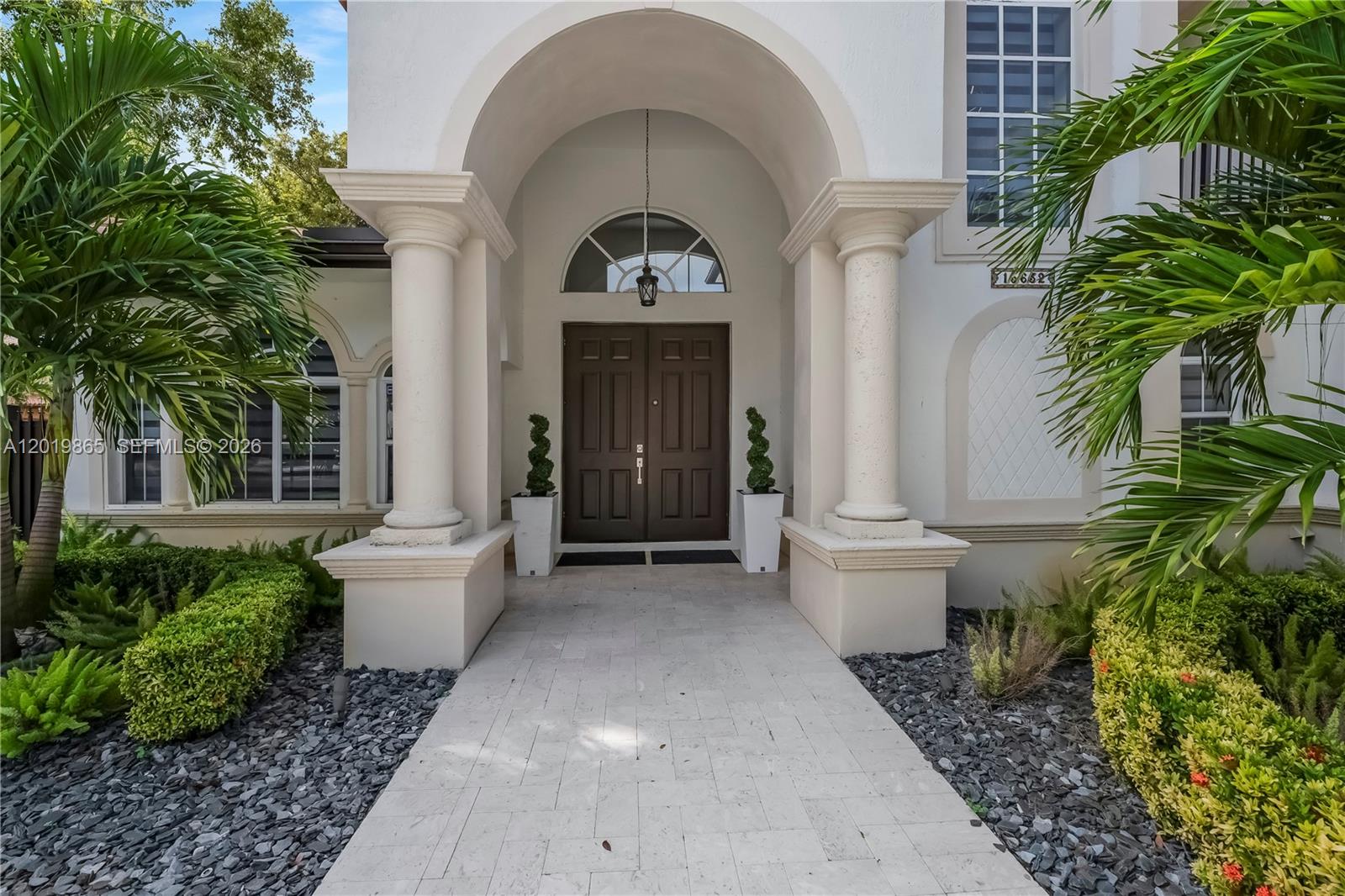 A two-story house with a tile roof, a large tree, and a paved driveway — 15632 NW 79th Ct, Miami Lakes FL 33016, MIAMI LAKES, FL