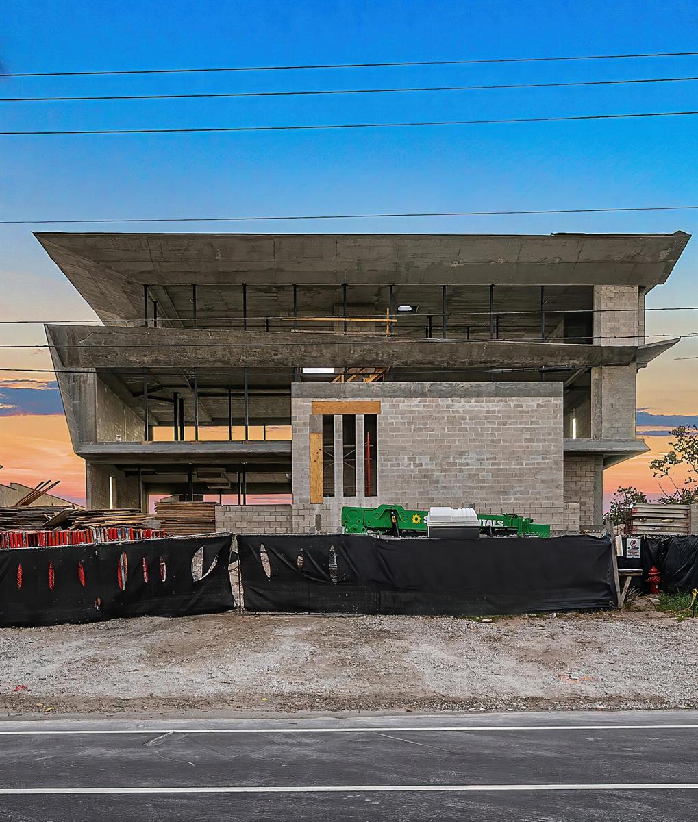 A multi-story concrete building under construction with exposed structural framing and a block wall facade — 3805 S Ocean Boulevard, Highland Beach FL 33487, HIGHLAND BEACH, FL