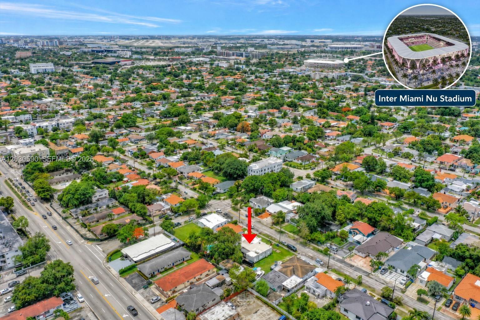 An aerial view shows a residential neighborhood with a red arrow pointing to a house — 3078 NW Flagler Ter, Miami FL 33125, MIAMI, FL