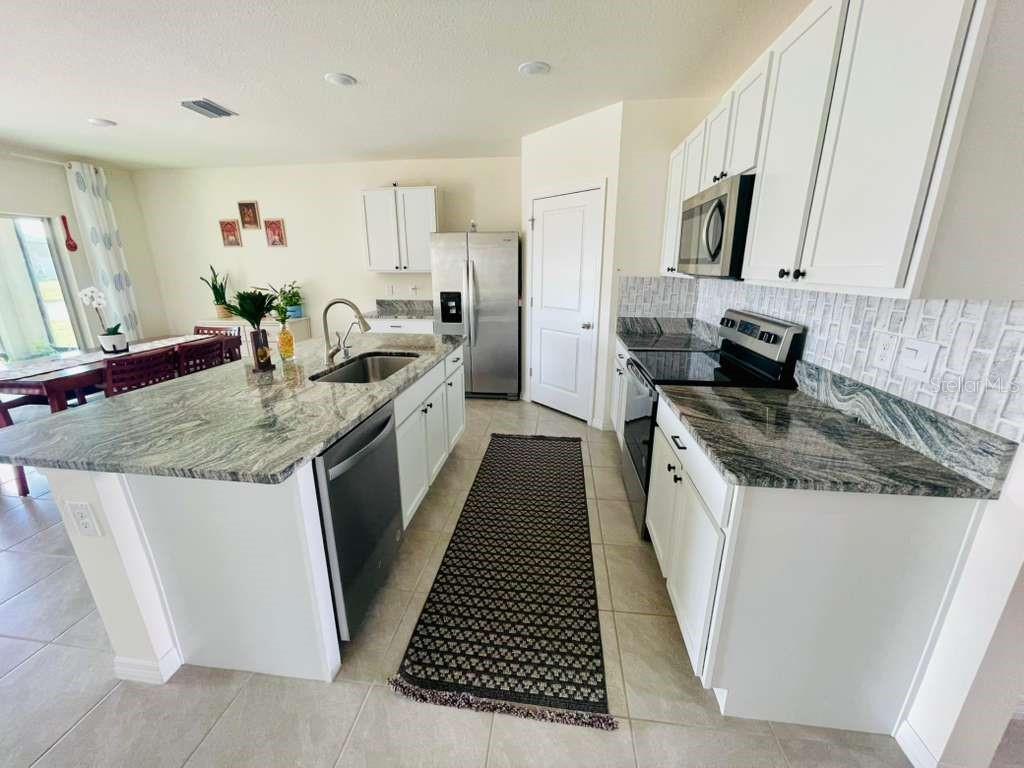8954 FORGE BREEZE LOOP, WESLEY CHAPEL, FL — photo 4 of 30