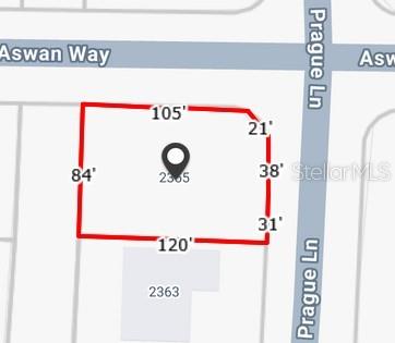This is a map showing the property boundaries and dimensions of a residential lot — 2355 PRAGUE LANE, PUNTA GORDA, FL