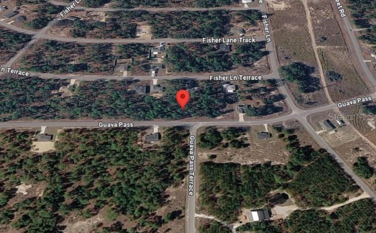 This is an aerial map view of a vacant, wooded residential lot — 9037-1222-05, OCKLAWAHA, FL