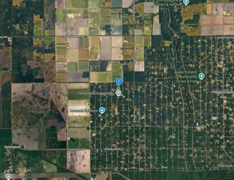 This is a satellite map view of a rural area with residential lots and roads — 10030 DELGADO AVENUE, HASTINGS, FL