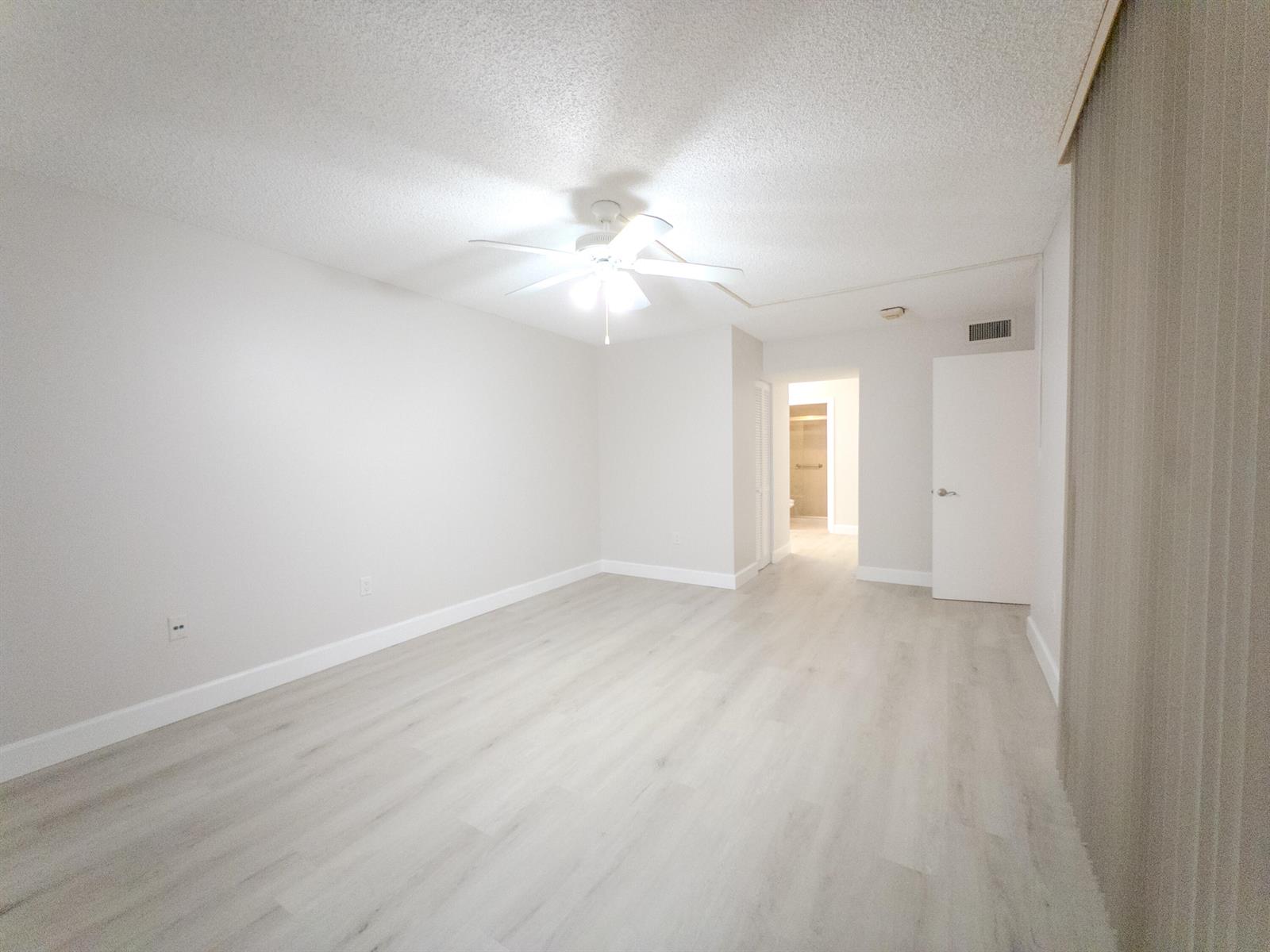 A kitchen features white cabinets, a white stove, a double sink, and patterned tile flooring — 2800 N 46th # A502, Hollywood FL 33021, HOLLYWOOD, FL