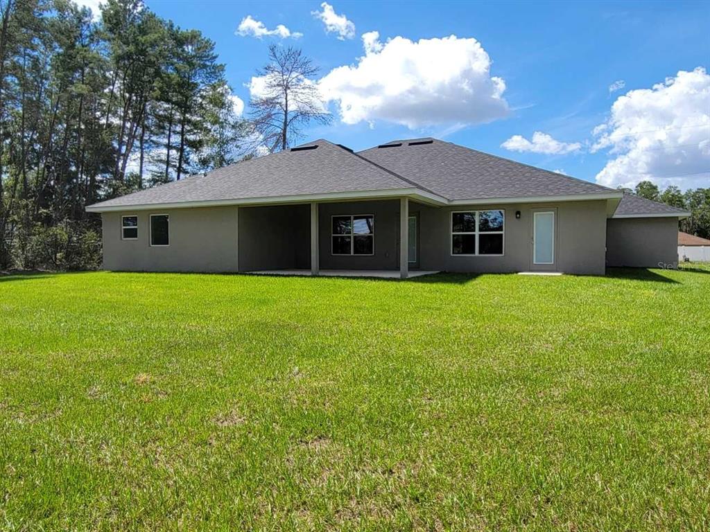 This is a floor plan for a 3,000-square-foot house with four bedrooms and three bathrooms — 12598 SW 73RD STREET, OCALA, FL