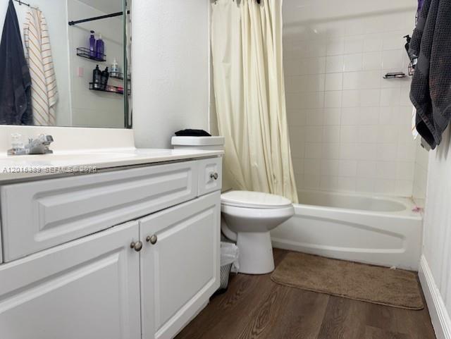 A bathroom features a white vanity, a toilet, and a shower-tub combination with white tiles — 5201 NW Geneva Way # 103, Doral FL 33166, DORAL, FL