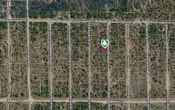 This is an aerial map showing a vacant lot highlighted in a residential grid — LOT 8 AND 9 KANSAS AVENUE, HAWTHORNE, FL