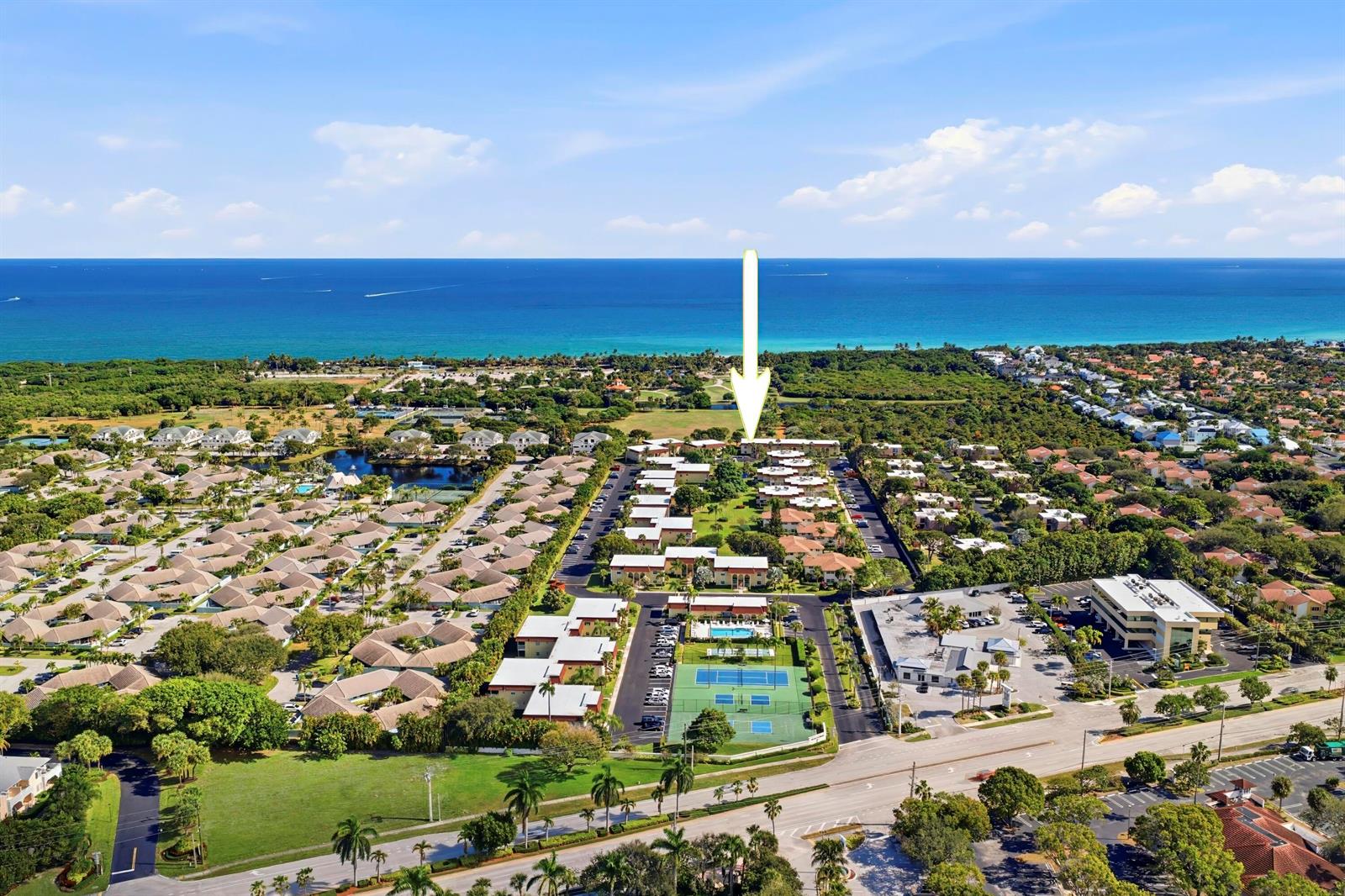 An aerial view shows a grassy park area with a path labeled beach access — 717 S Us Highway 1 # 608, Jupiter FL 33477, JUPITER, FL