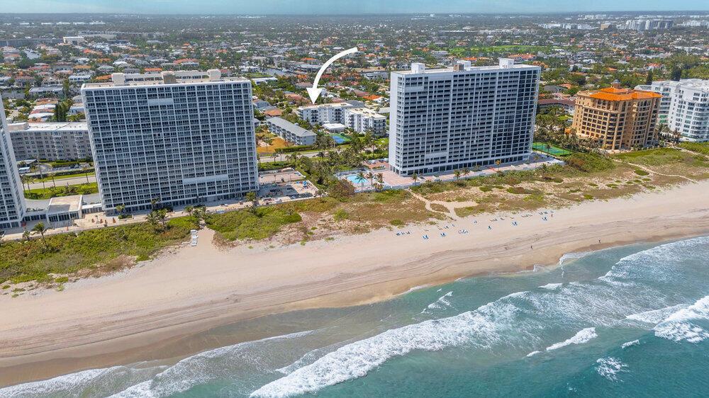 An aerial view of two high-rise apartment buildings located directly on a sandy beach — 2679 S Ocean Boulevard # 31, Boca Raton FL 33432, BOCA RATON, FL