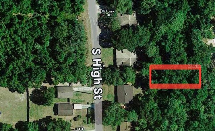 An aerial map view shows a rectangular plot of land highlighted in red near roads — NO STREET, DELAND, FL