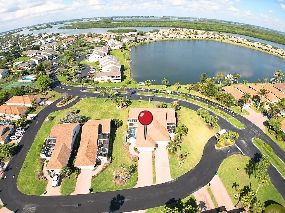 An aerial view shows a residential house with a pool and a red location pin — 204 River Walk, Fort Pierce FL 34949, FORT PIERCE, FL