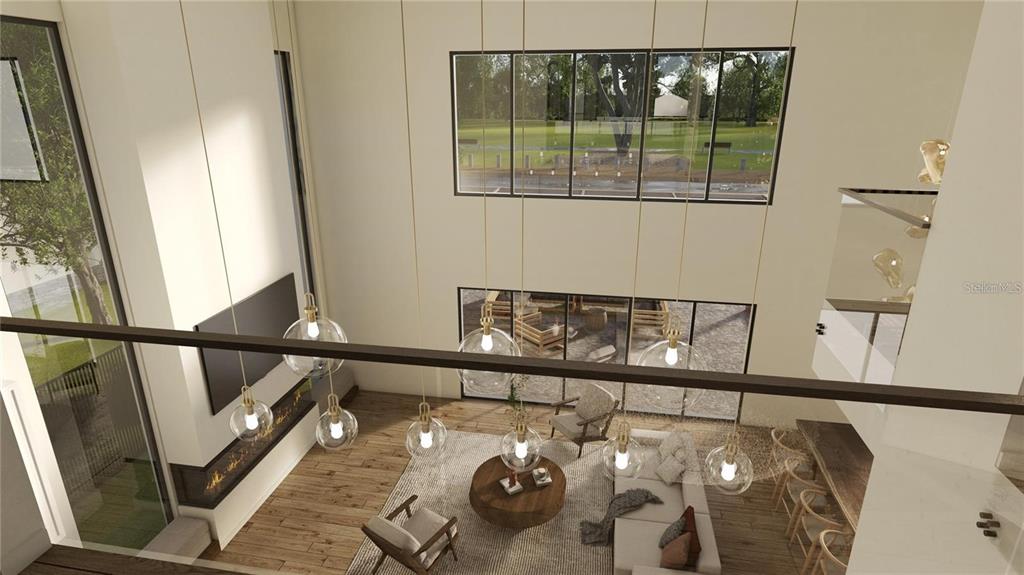 This rendering shows a high-ceilinged living room with a fireplace, pendant lights, and large windows — 1004 W FRIBLEY STREET, TAMPA, FL