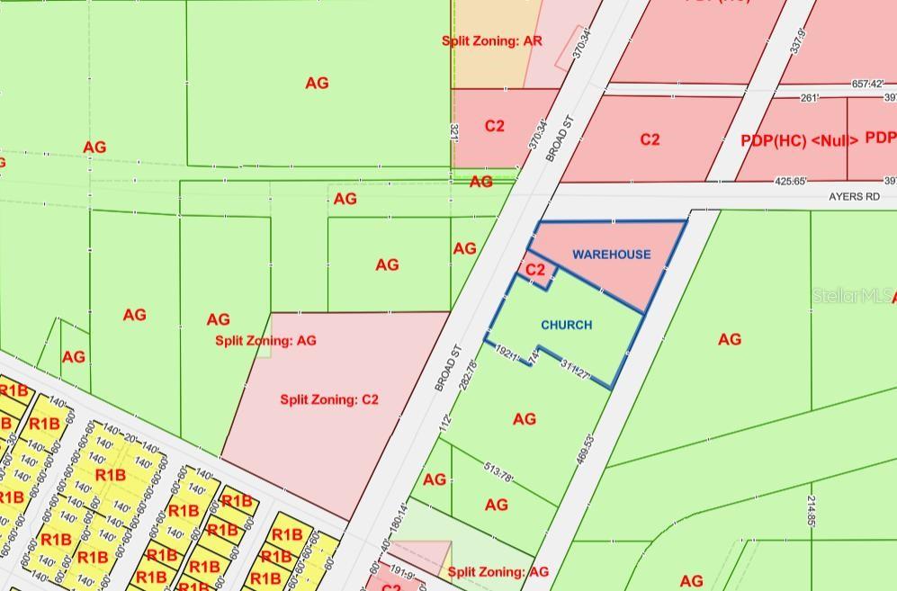 This image is a zoning map showing various land use designations and property boundaries — BROAD STREET, BROOKSVILLE, FL
