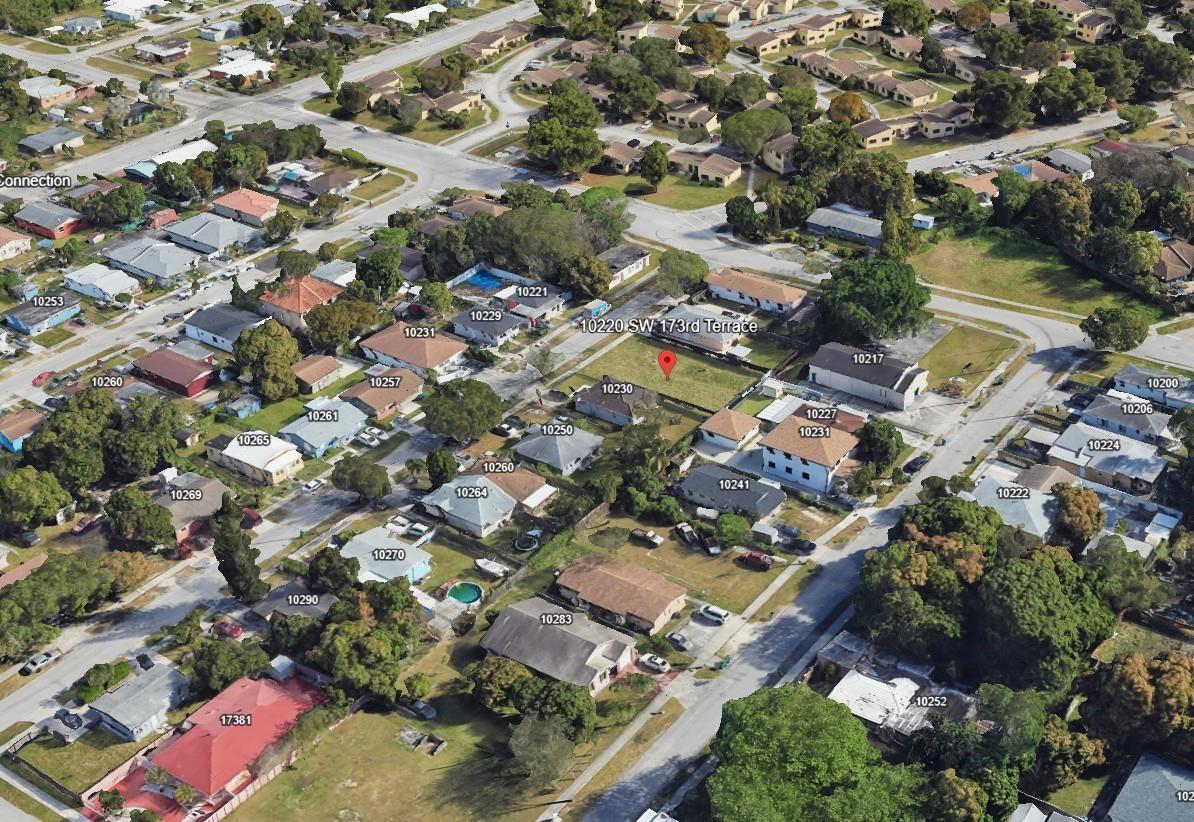 This is an aerial view of a residential neighborhood featuring a vacant lot — 10220 SW 173rd Terrace, Miami FL 33157, MIAMI, FL
