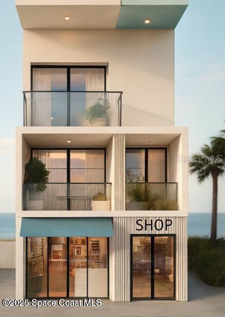 This is a rendering of a three-story building featuring a ground-level shop and upper balconies — 118 N ATLANTIC AVENUE, COCOA BEACH, FL