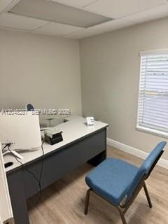 A small office with a desk, a blue chair, and a window with white blinds — 4603 N Armenia, Tampa FL 33603, TAMPA, FL