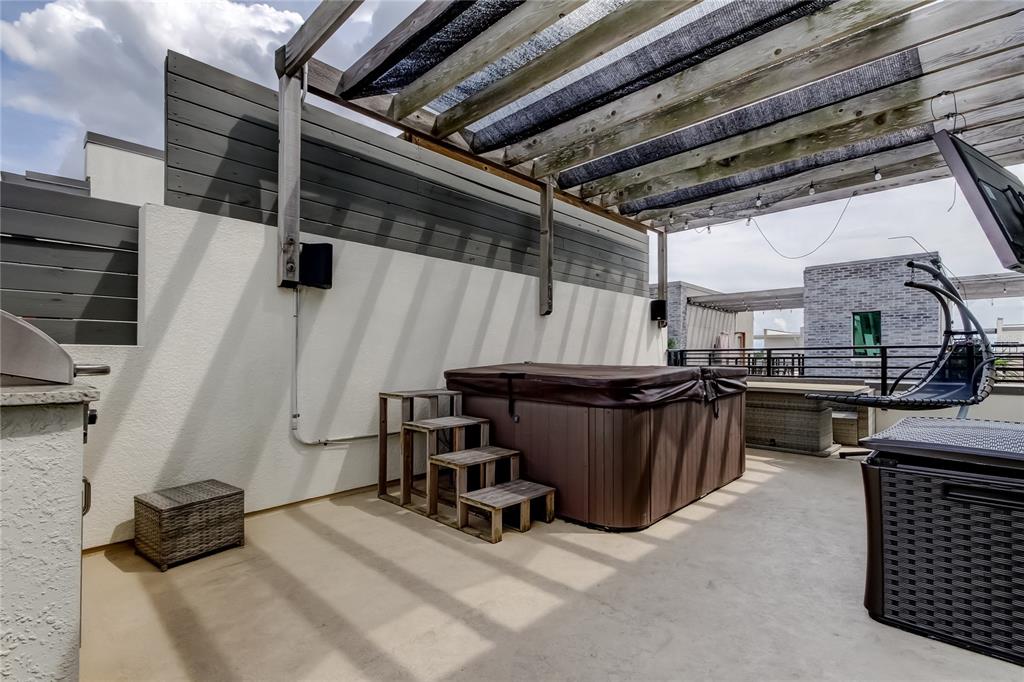 A rooftop patio features a hot tub with steps, a pergola, and outdoor furniture — 2511 N GRADY AVENUE UNIT 78, TAMPA, FL