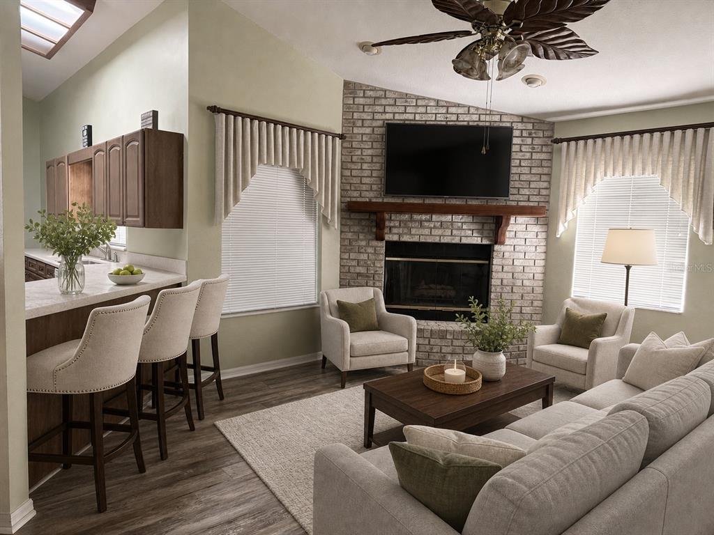 A living room with a brick fireplace, television, seating area, and an adjacent kitchen bar — 5402 SW 85TH STREET, OCALA, FL
