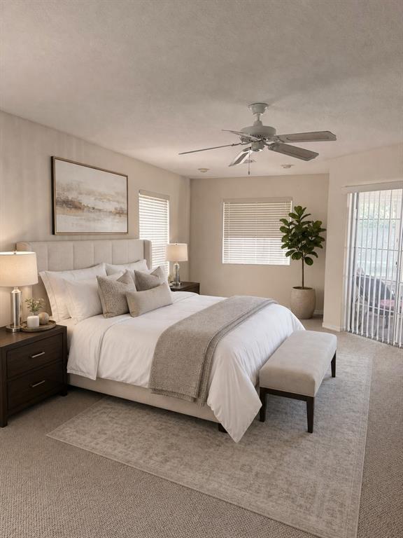 A neutral-toned bedroom features a queen bed, dark wood nightstands, and a ceiling fan — 5402 SW 85TH STREET, OCALA, FL