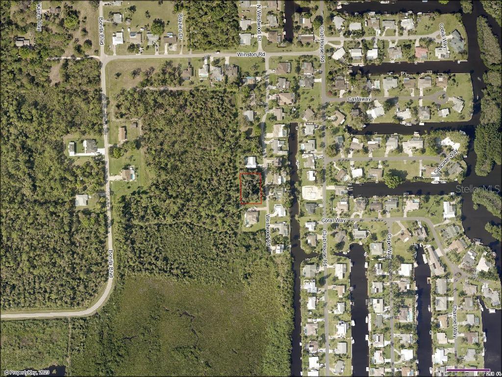 This is an aerial map showing a vacant lot outlined in red within a residential neighborhood — 2271 WESTWOOD ROAD, NORTH FORT MYERS, FL