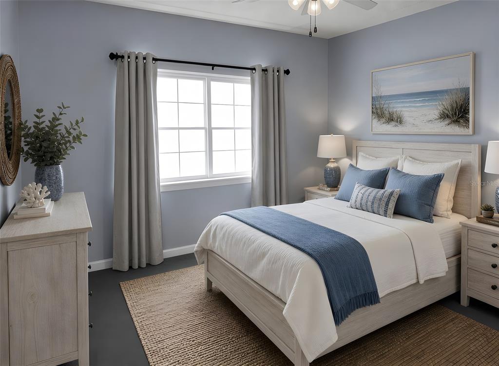 A living and dining area with hardwood floors, a neutral sofa, and a round table — 7001 INTERBAY BOULEVARD UNIT 178, TAMPA, FL
